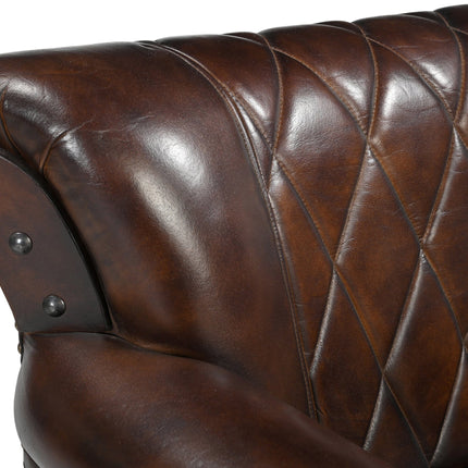 STUDDED LEATHER ARM CHAIR